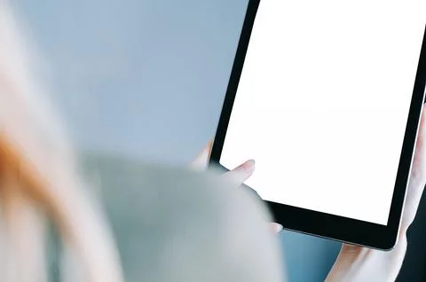 Close-Up of Tablet with Blank Screen in Hands Indoors Stock Photos