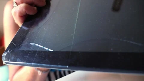 Close-Up of Tablet with Cracked Screen Stock Footage 279924032