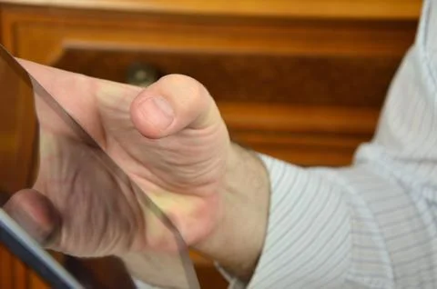 Close-up of tablet in hands Stock Photos
