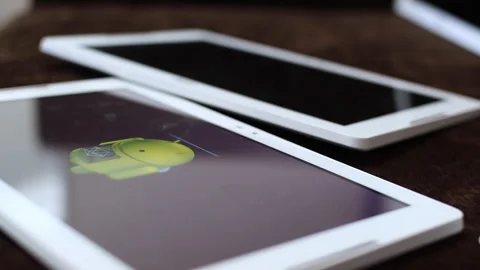 Close up of the tablet showing Google Android for updating the system. Stock Footage 245626076