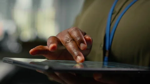 Close up of tablet used by admin in office doing software development Stock Footage 323236880