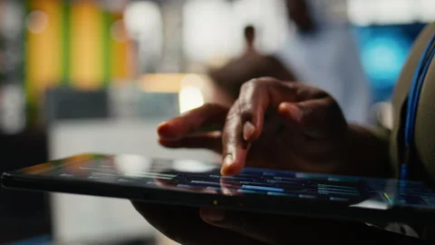Close up of tablet used by admin in office doing software development Stock Footage 323331467