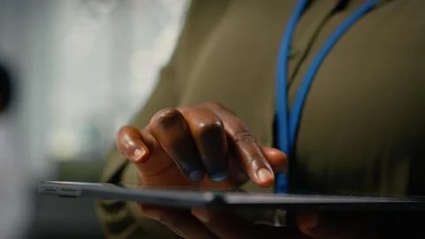 Close up of tablet used by admin in office doing software development Stock Photos