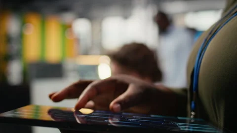 Close up of tablet used by programmer in office to accelerate tasks Video stock 322697014