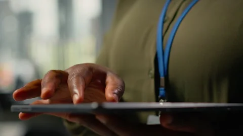 Close up of tablet used by programmer in office to accelerate tasks Video stock 323029263