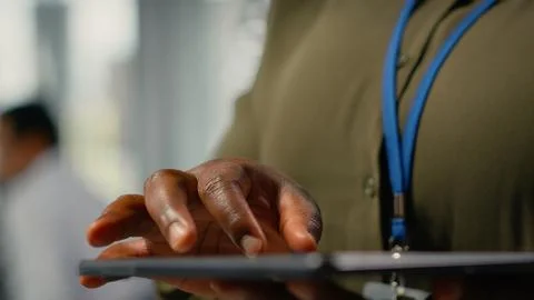 Close up of tablet used by programmer in office to accelerate tasks Stock Photos