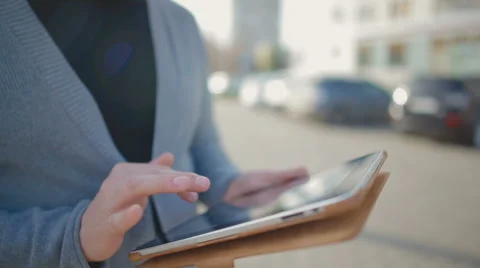 Close-up of the tablet which is held in hand by the man Video stock 62112801