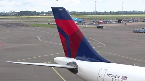 Close tail delta airlines airbus a330 parked gate amsterdam schiphol airport fin Stock Footage 283666076