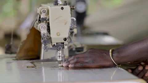 Close Up Of Tailor Sewing Fabric With Electric Sewing Machine Stock Footage 336426273
