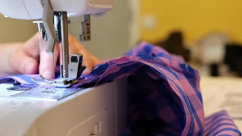 Close Up of Tailor Sewing Fabric With Electrical Sewing Machine. Stock Footage 344054463