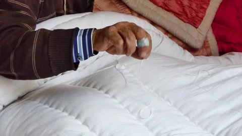 Close-up of a tailor sewing a quilt in the workshop Stock-Footage 243729816