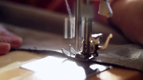 Close-up The tailor sewing on the sewing machine Video stock 70387817