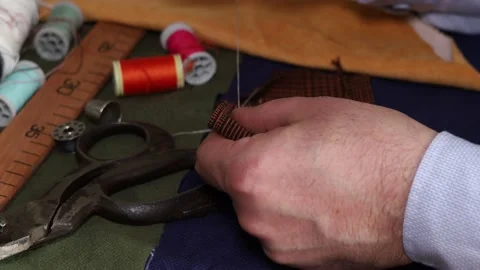 Close-up tailor is sewing in workshop Stock Footage 172471533