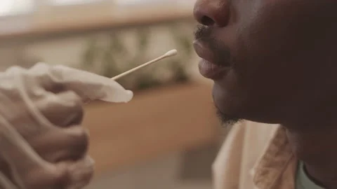 Close-Up of Taking Throat Sample for PCR Stock Footage 159542960
