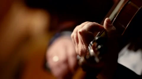 Close-up of a talented violinist playing classical music on the violin Видео 221692715