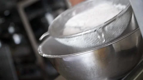 Close up of tamiser farine 스톡 동영상 238503969