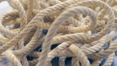 Close-up of a tangled rope spinning. Stock Footage 74513934