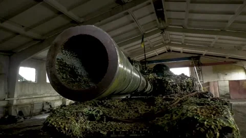 A close-up of the tank's muzzle slowly t... | Stock Video | Pond5