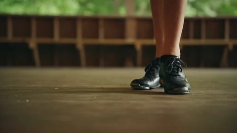 Close up of tap dancer feet performing on a wooden stage Video stock 334106748