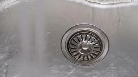Close-up of tap water in the kitchen Stock Footage 285474030