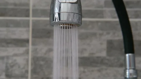 Close-up of tap water in the kitchen Video stock 285474205