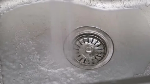 Close-up of tap water in the kitchen Stock-Footage 286734639
