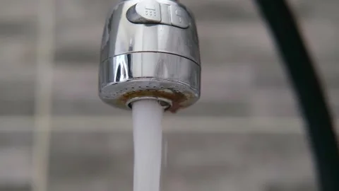 Close-up of tap water in the kitchen Stock Footage 287434869