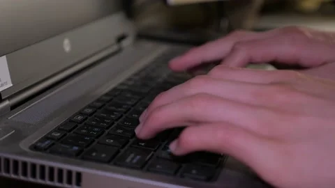 Close up of taping on keyboard text writing computer hands electronics work 库存影片 156260439