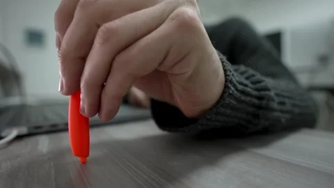 Close-up of tapping ballpoint pen on desktop. Stock Footage 260810651