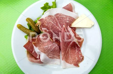Close up of tasty cold meats on the table Stock Photos