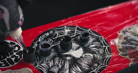 Close up tattoo artist shows the process of getting tattoos with paint. Stock Footage 236331259