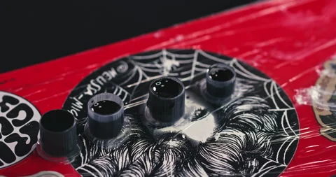 Close up tattoo artist shows the process of getting tattoos with paint. Stock Footage 236331748
