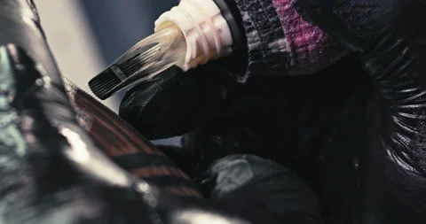 Close up tattoo artist shows the process of getting tattoos with paint. Stock Footage 236333394
