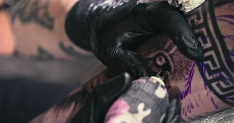 Close up tattoo artist shows the process of getting tattoos with paint. Stock Footage 236336967
