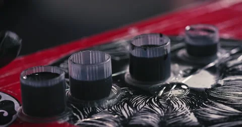Close up tattoo artist shows the process of getting tattoos with paint. Stock Footage 236337141