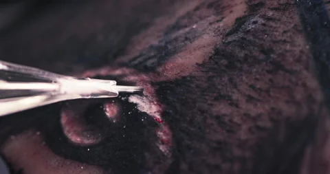 Close up tattoo artist shows the process of getting tattoos with paint. Stock Footage 236341235