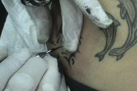Close Up Of Tattoo Being Done Stock Footage