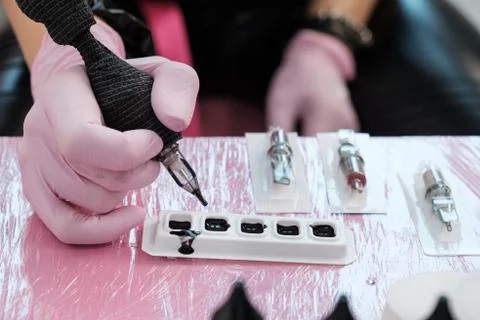 Close up of tattoo master tools. Needles, inks, petroleum jelly and disinfectant Foto stock