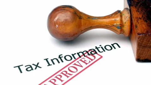 Close up of tax information approved Stock Footage 345006857