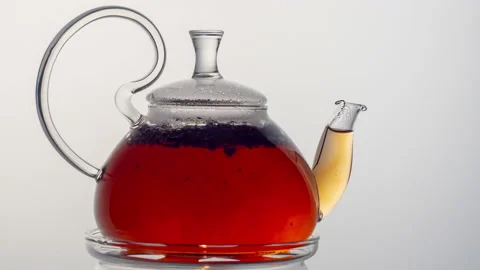 Close up of tea brewing. Tea leaves with boiling water. Stock Footage 164706368