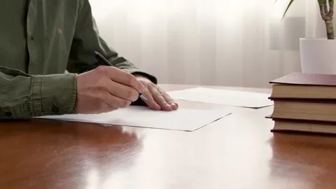 Close-Up Of A Teacher Examining And Grading Test At Home. Stock Footage 150264842