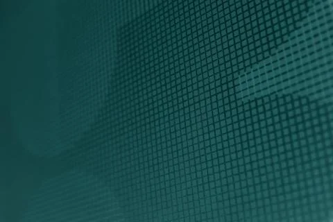 Close-up of a teal grid texture with repeating pattern of squares and lines Stock Photos