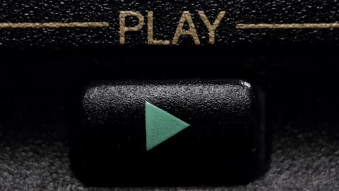 Close-Up Teal Play Button Being Pressed Stock Footage 321519390