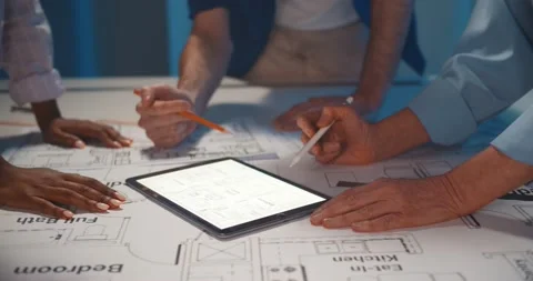 Close-up of team architects working on construction project in office Stock Footage 154142574