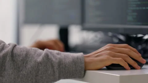 Close-Up of Technical Programmer Typing Code on Multiple Monitors. Video stock 300245901
