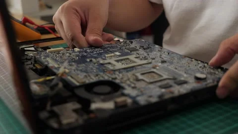 Close up of technician engineer trying to repairing broken laptop. Computer r Video stock 152718089