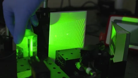 A Close up of technician hands calibrating laser device Stock Footage 155539841