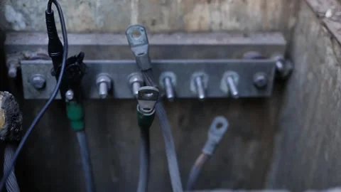 Close-Up of Technician Using Clamps to Measure Soil Resistance Stock Footage 297919438