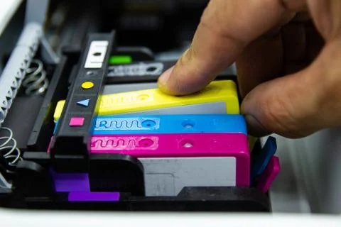 Close up Technicians are installing the color printer inkjet Stock Photos