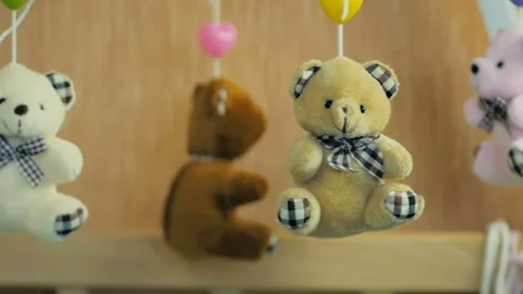 Close-up of a teddy bears on a children carousel as a symbol of childhood... Stock Footage 97490672